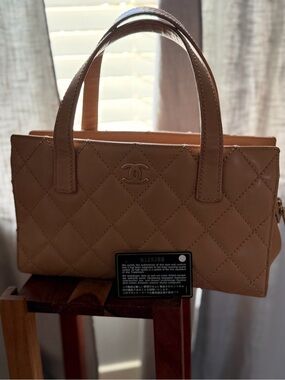 CHANEL Quilted Top-Handle Purse in Tan Beige